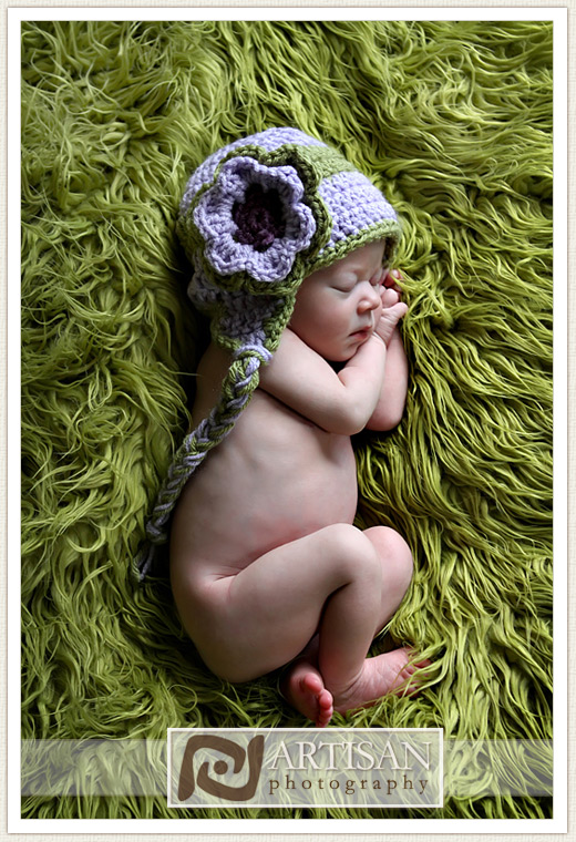 baby girl with purple and lavender aviator hat