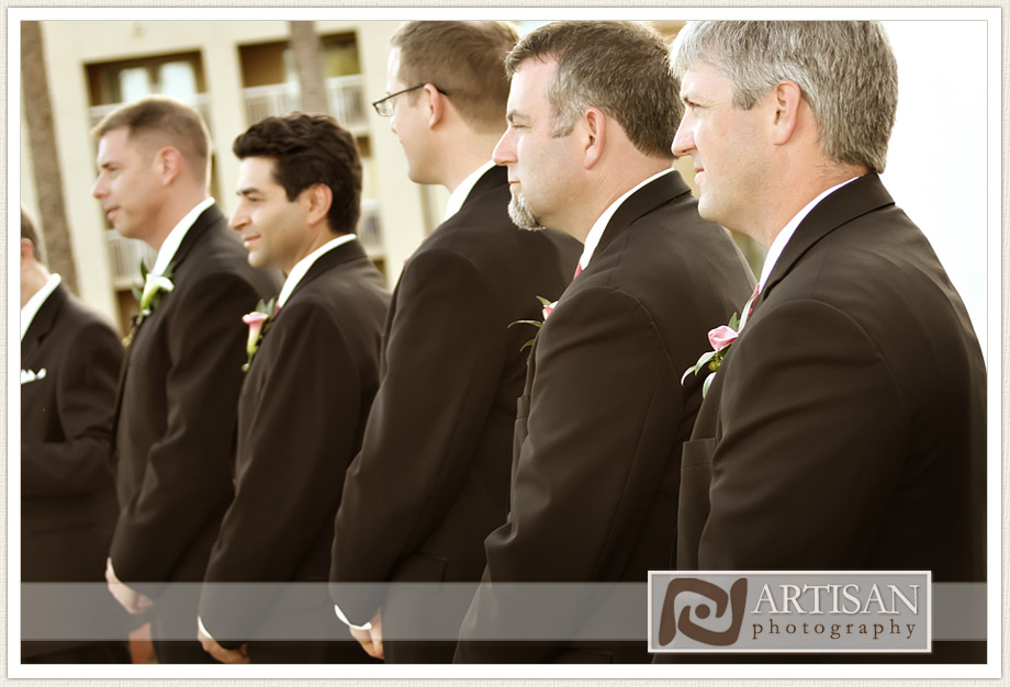 groomsman lineup during the ceremony outside