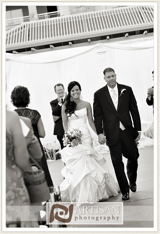 Bride and Groom walking out after the ceremony