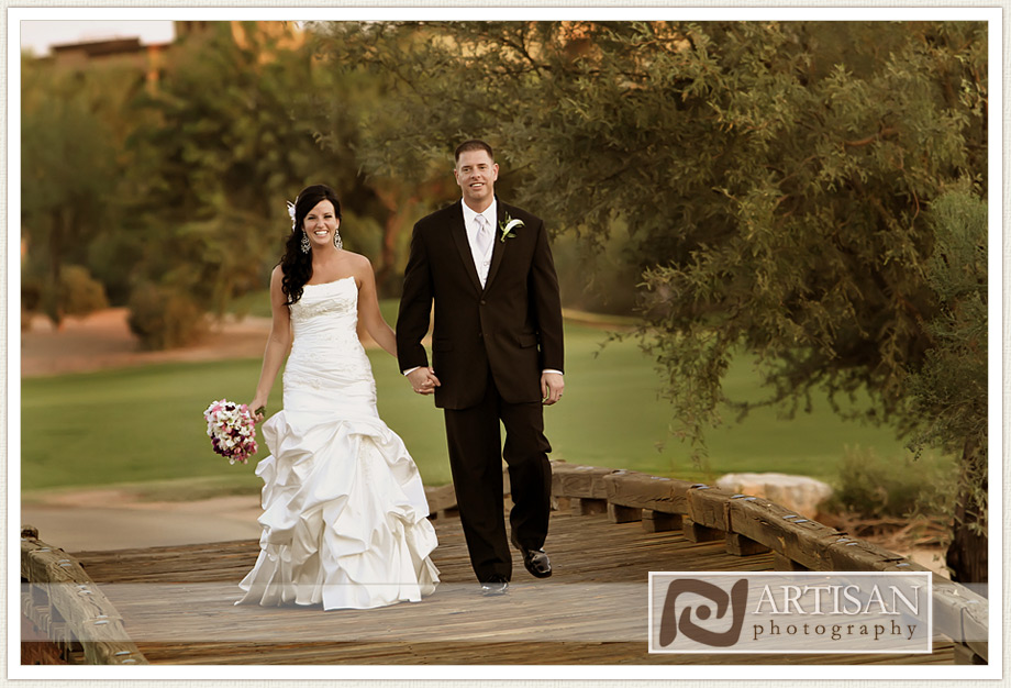 Bride and Groom walking on the bridge