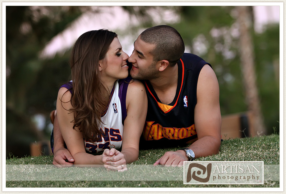 engagement photos at the park in Gilbert couple with sports jerseys