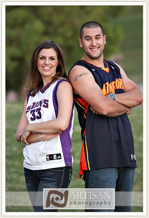 engagement photos at the park in Gilbert couple with sports jerseys