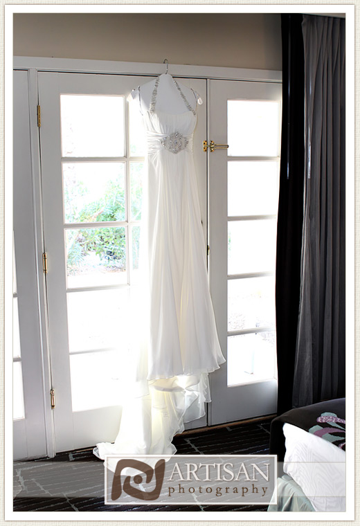 Wedding Dress hangin on a hanger at Firesky Resort Hotel Room