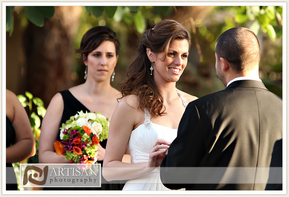 Bride and groom looking at each other during ceremony at Firesky