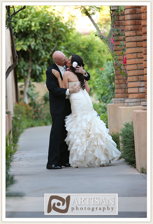 Royal Palms Wedding image of  bride and groom passionate kiss