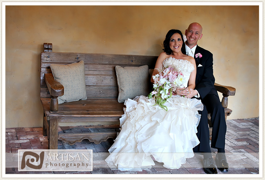 Royal Palms Wedding image of bride and groom sitting on wooden double chair