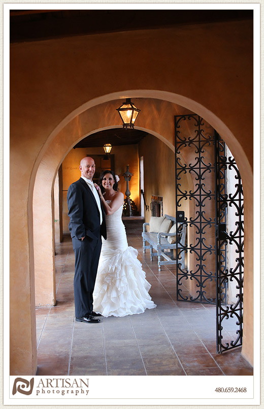 Royal Palms Wedding image of  bride and groom together under arch 