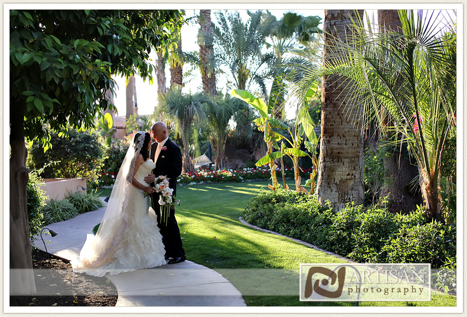 Royal Palms Wedding image of  bride and groom on walkway looking at each other