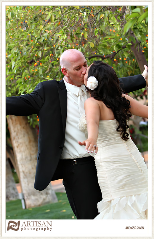 Royal Palms Wedding image of bride and groom with arms open 