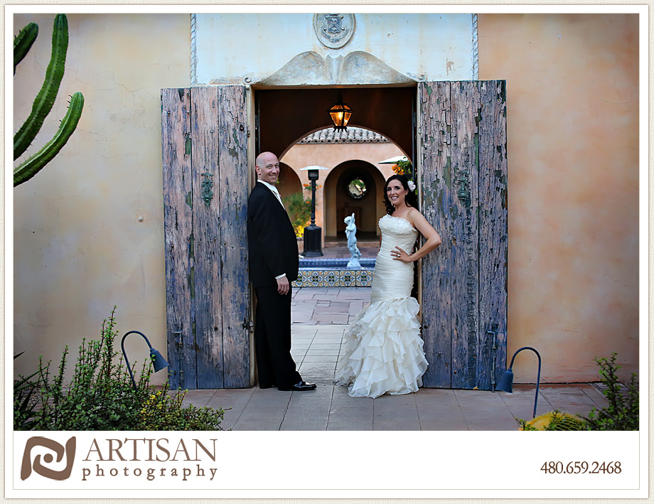 Royal Palms Wedding image of bride and groom in front of rustic double doors