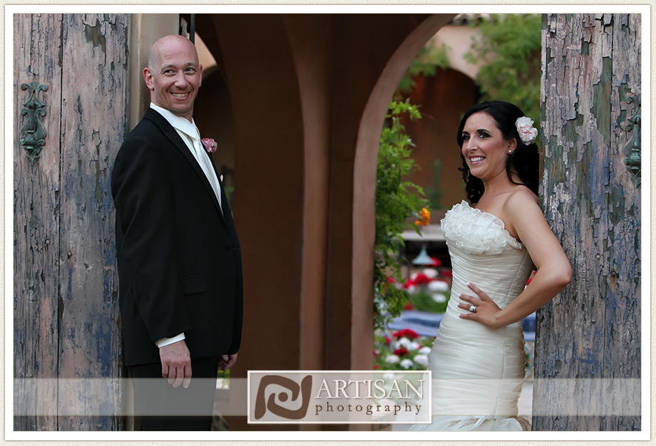 Royal Palms Wedding image of bride and groom in front of rustic double doors