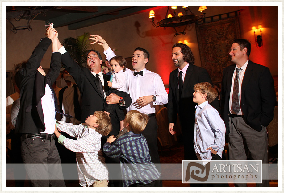 Royal Palms Wedding image of  guys catching the garter