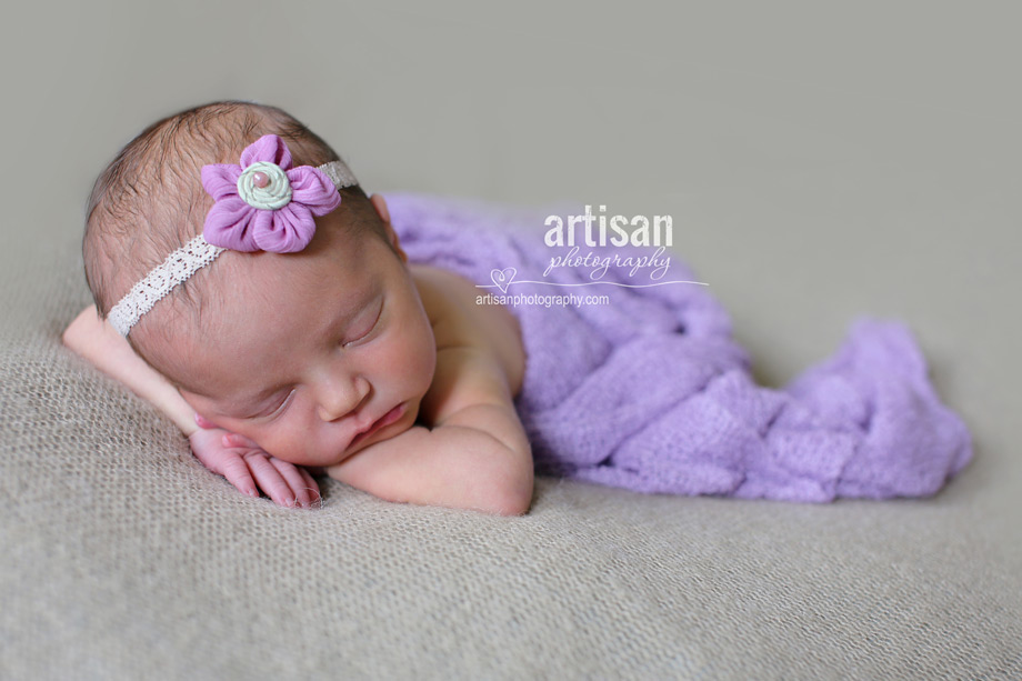 newborn baby girl photo at our Carlsbad studio in California in lavander photo prop