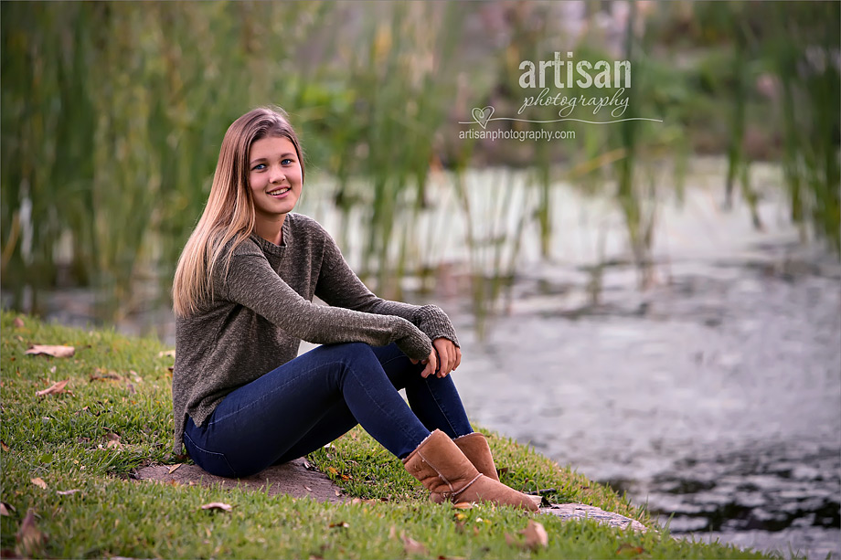 High school senior photo girl by the water