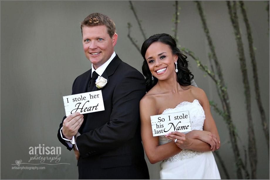 Bride & Groom at The Sanctuary Mountain holding cute signs