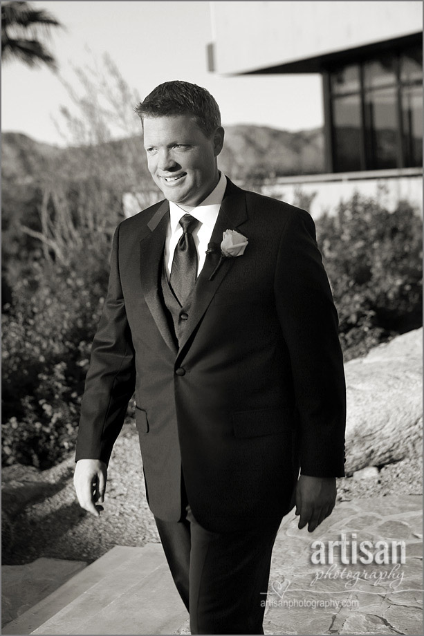 Groom walking down the aisle