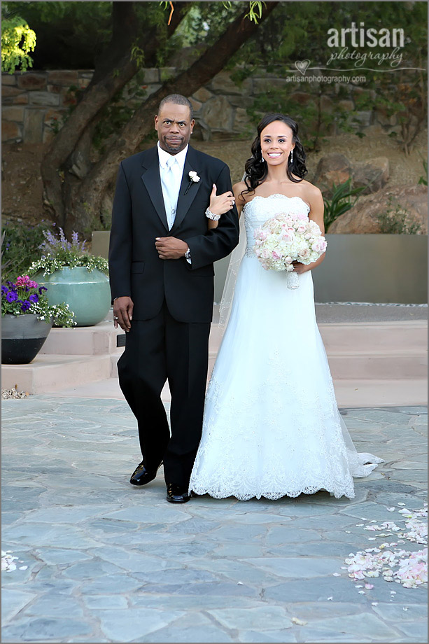 Bride and her father walking down the aisle