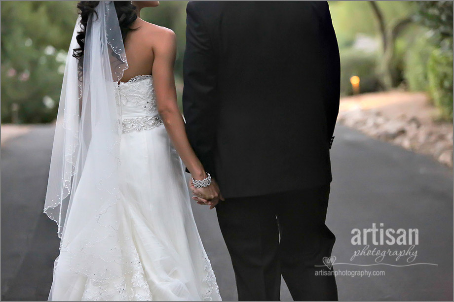 Bride and Groom holding hands