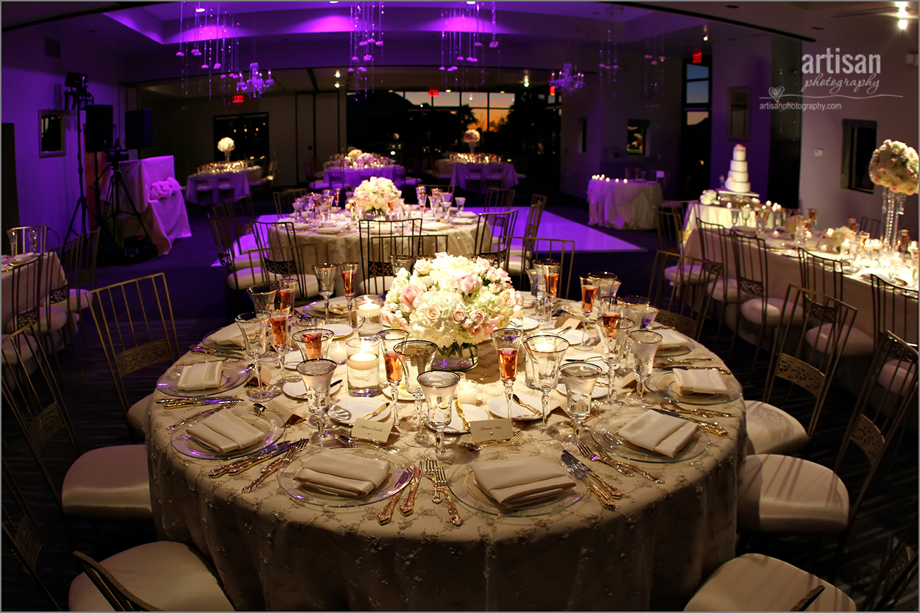 Sanctuary Camelback Mountain Resort ballroom decorated for a wedding with up lighting and fancy linens