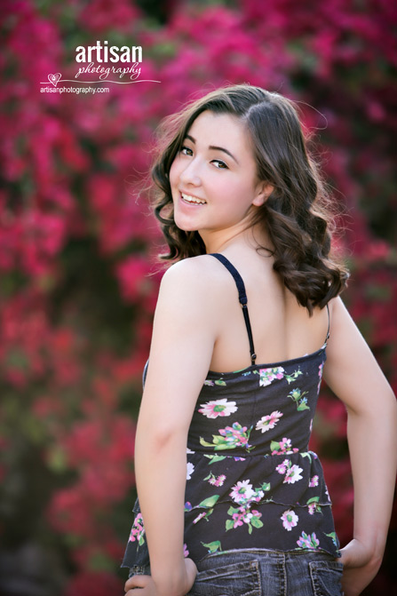 High School Senior photo of Girl with bouganvilleas in the background