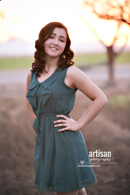 High School Senior photo of girl on a orchard