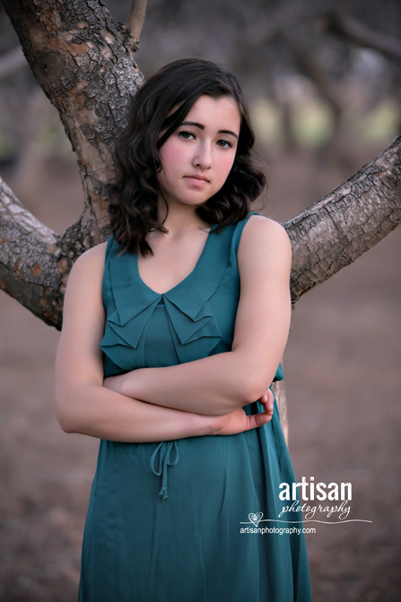 High School Senior photo of girl on a orchard