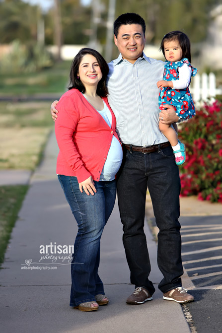 family maternity image mother, father and daughter