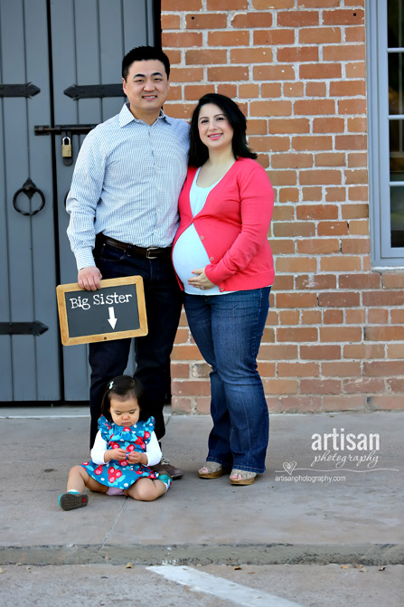 family photo with chalkboard as a photography prop