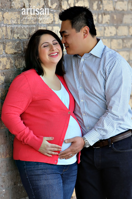 couple acting loving during maternity photoshoot