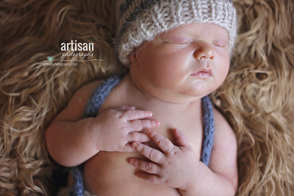 close up of baby boy hands in Carlsbad photography studio California