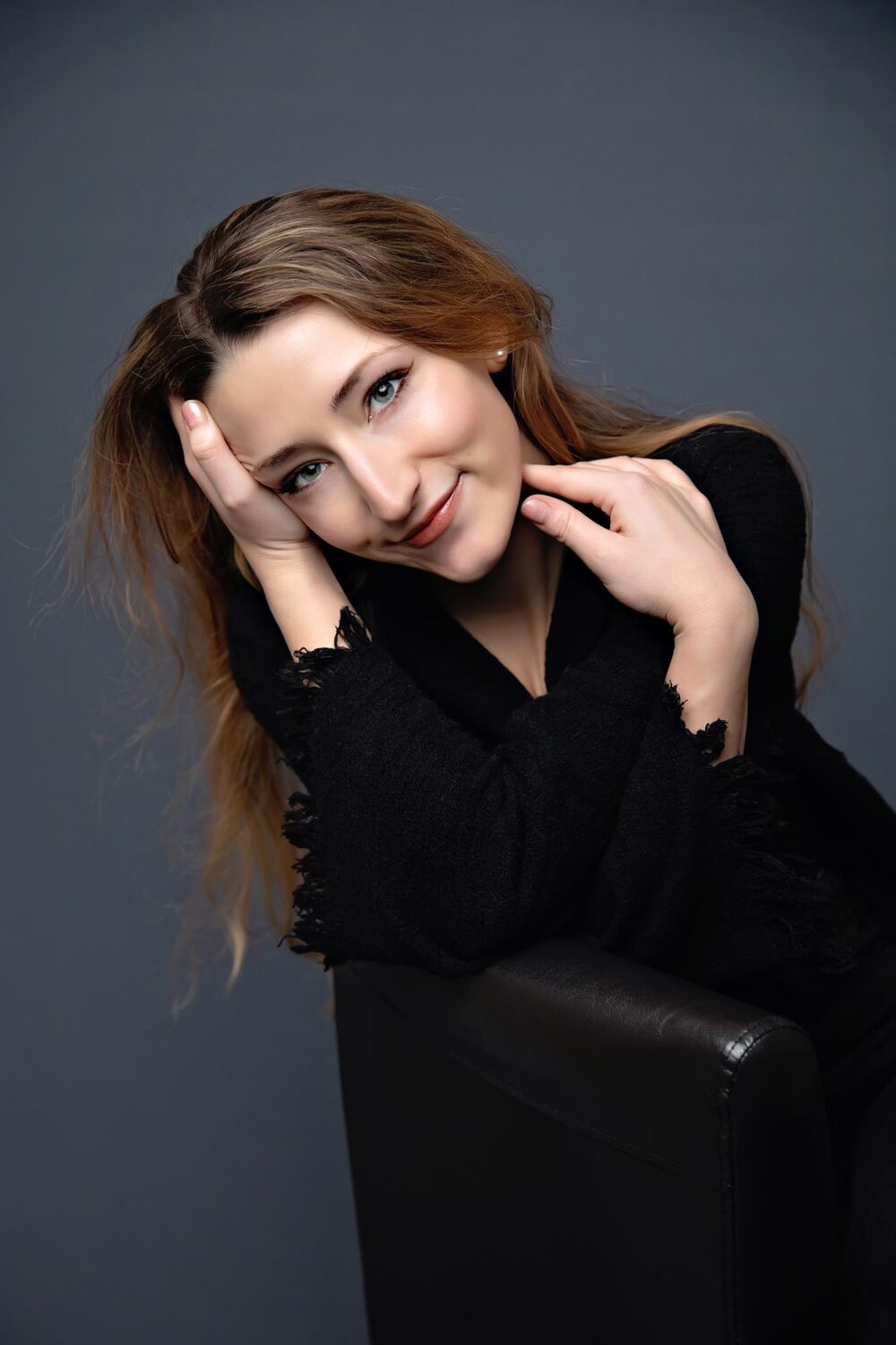 young women casually posing in studio