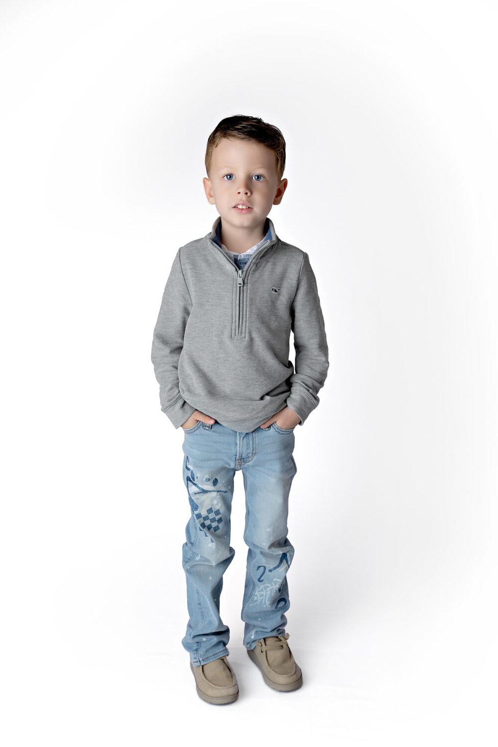 young boy portrait in studio - full body