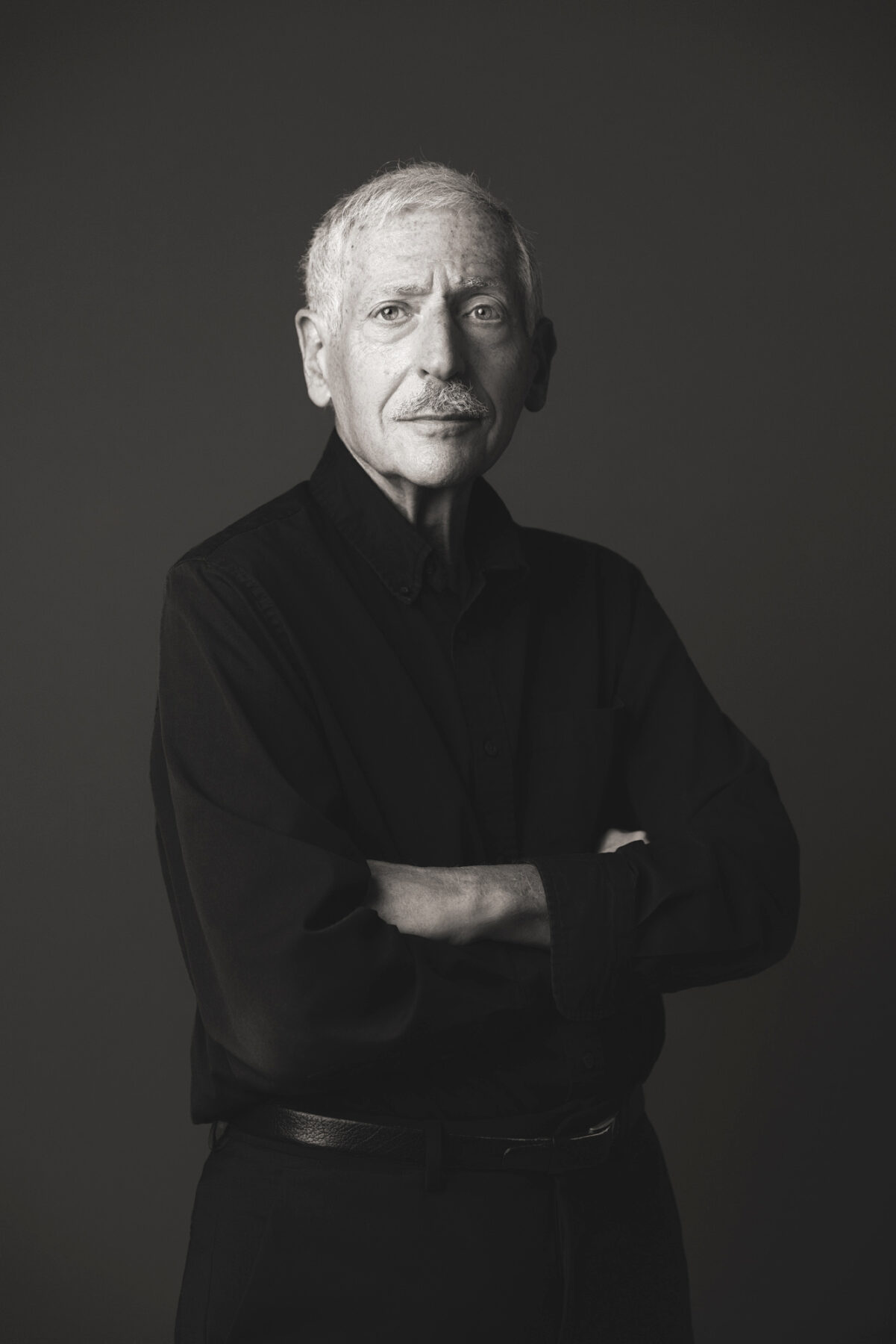 black and white headshot of older gentleman